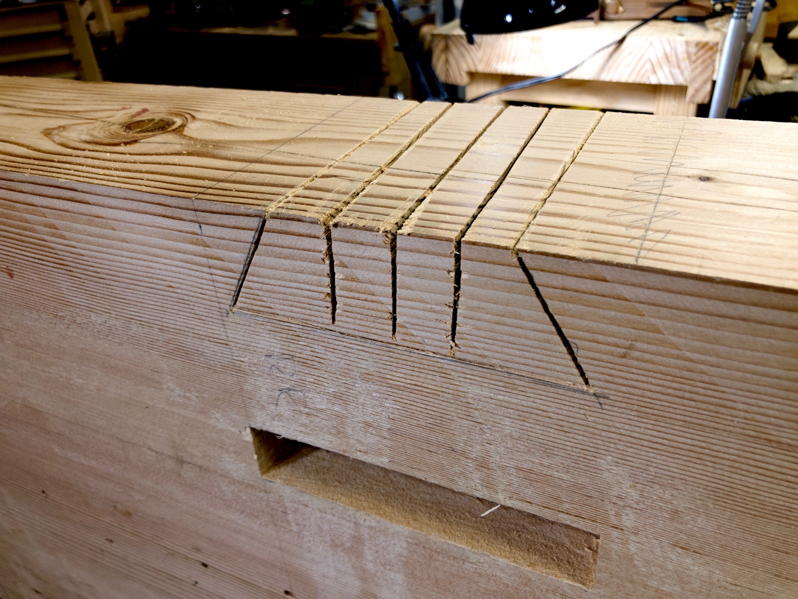 More cuts in the middle of the joint.