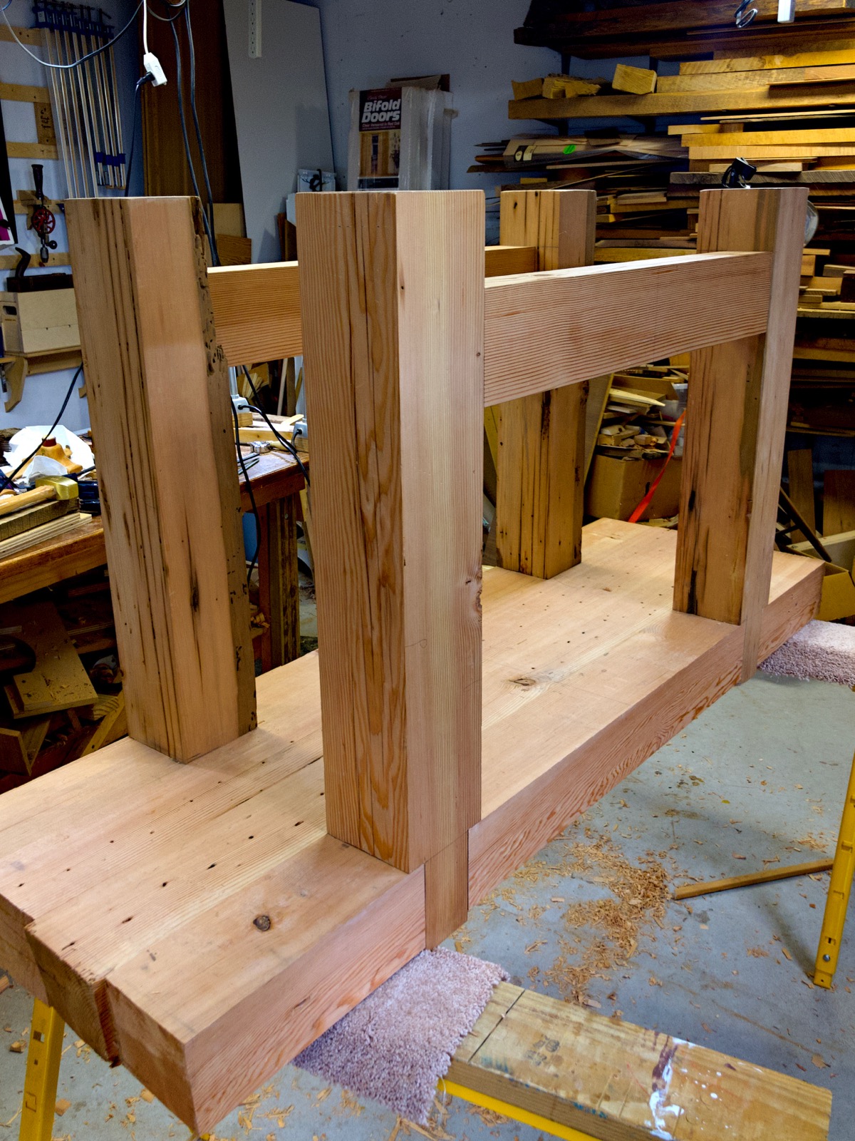 The legs and the long stretchers.