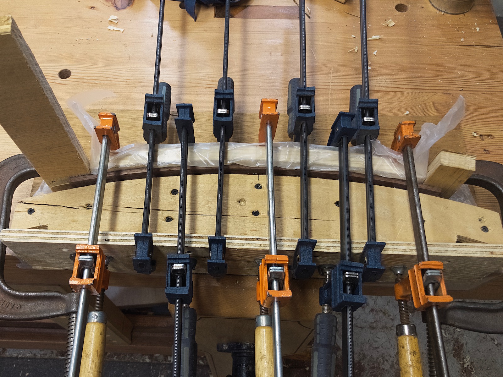 Curved drawer front in clamps